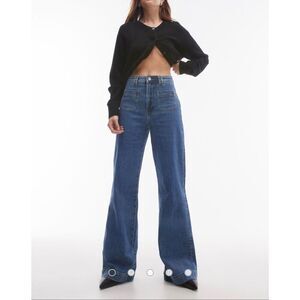 & Other Stories High Rise Flared Jeans with Patch Pockets in Mid Blue Wash 28